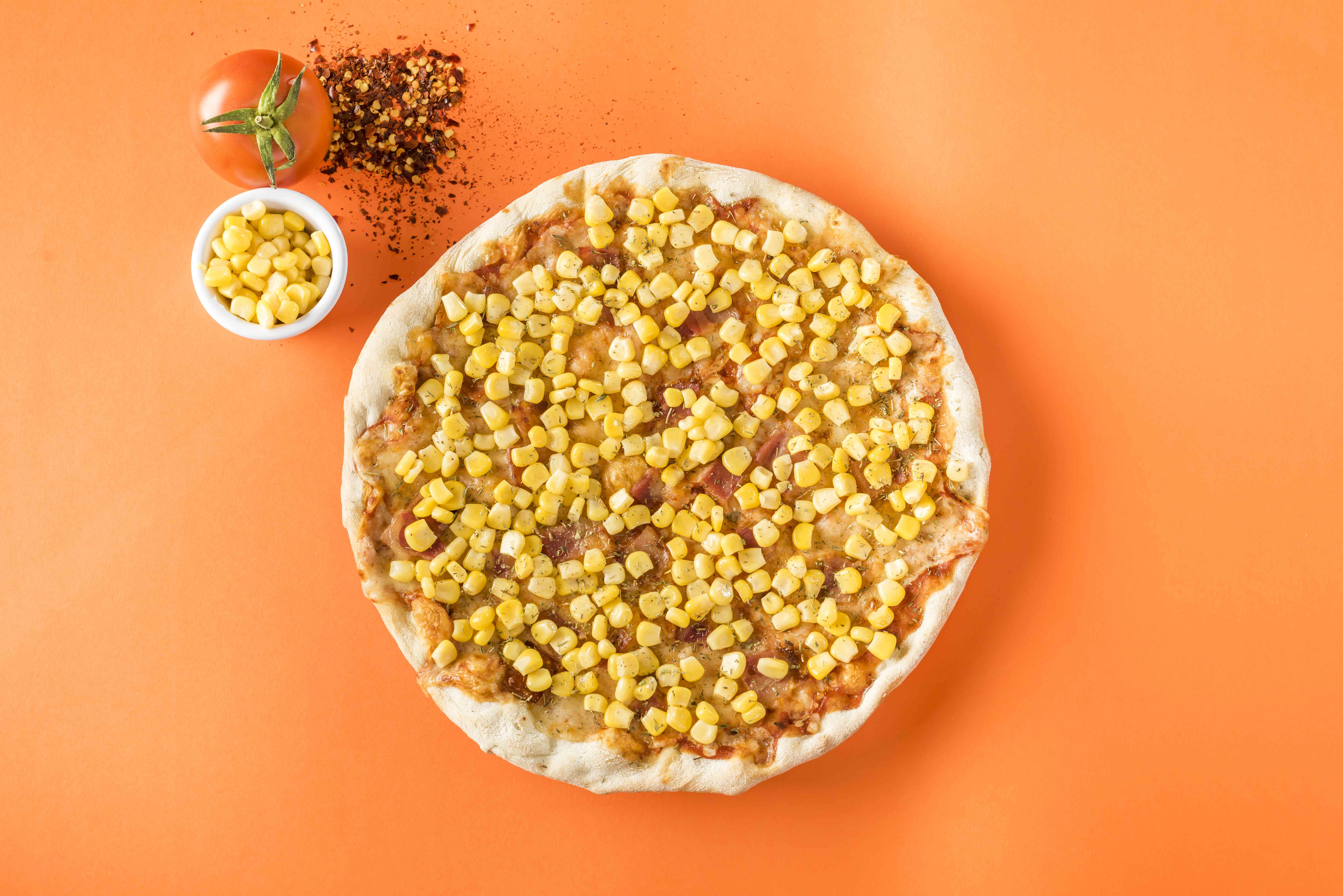 Pizza Maíz y Tocineta Tradicional.